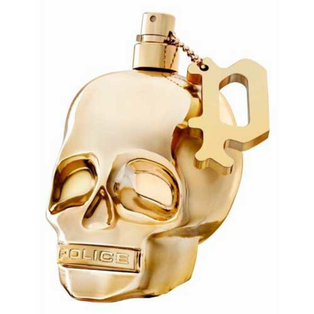 Flacone dorato a forma di teschio. Con vaporizzatore e ciondolo. Scritta: POLICE.