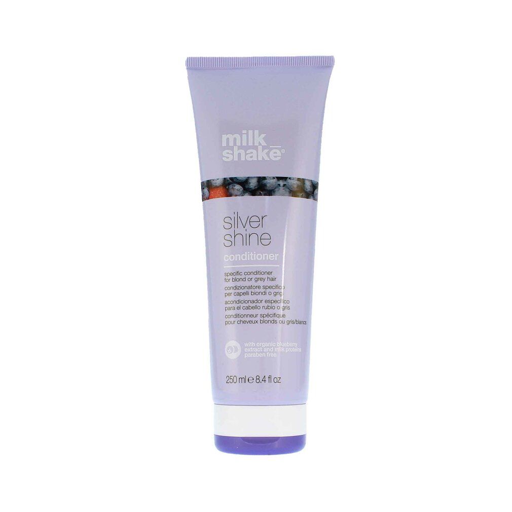 Tubo lilla con scritta "milk shake" e "Silver Shine Conditioner". Contiene 250 ml. Motivo mirtilli.