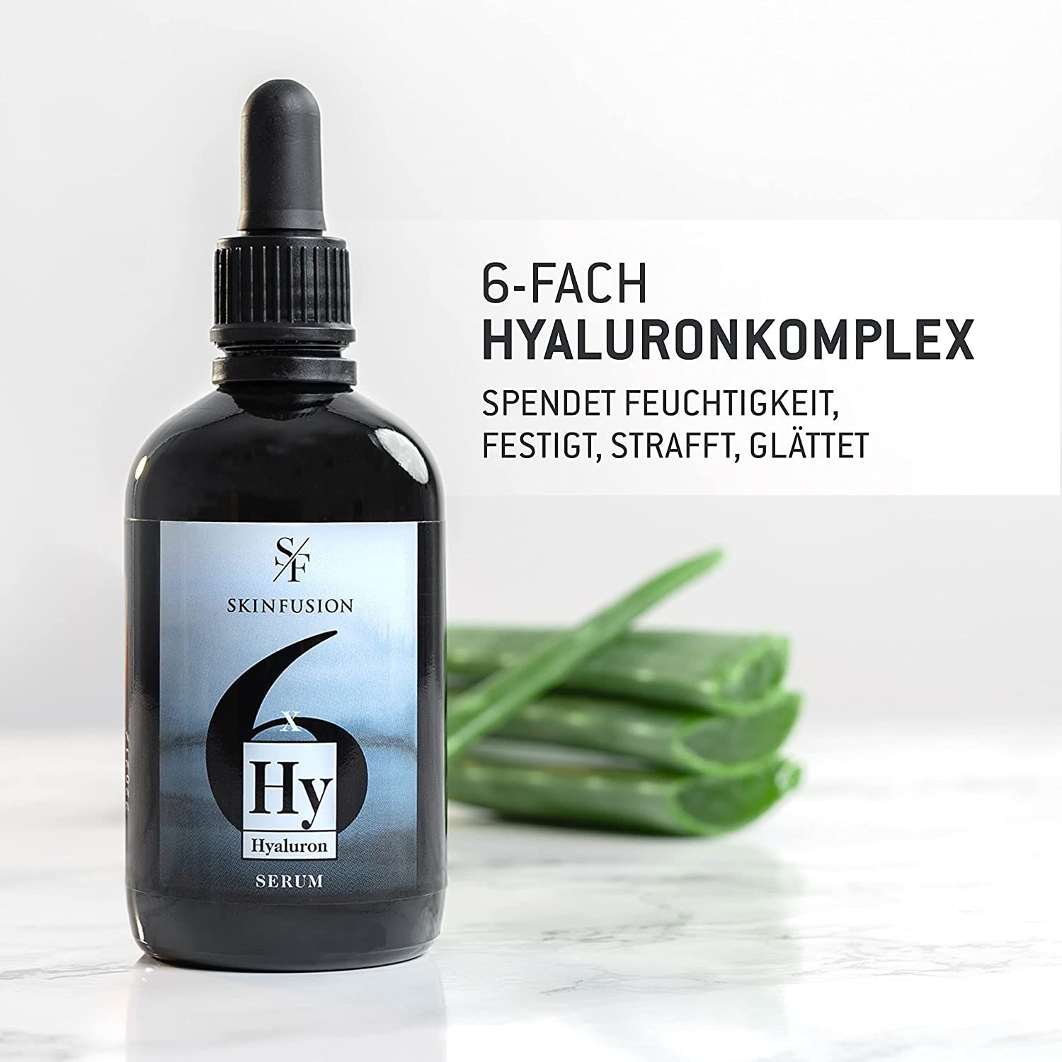 Flacone nero con siero, pipetta. Testo: 6-Fach Hyalurankomplex. Foglie di aloe vera sullo sfondo.