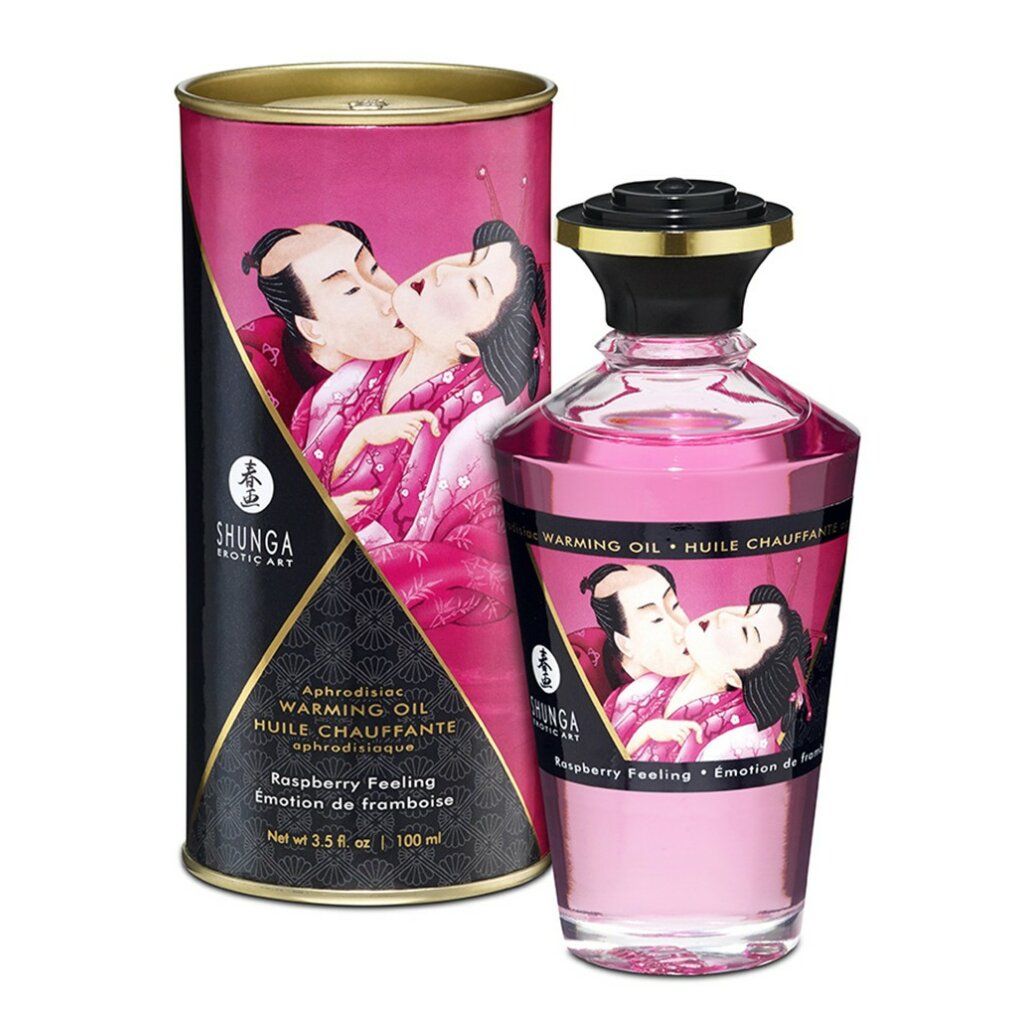 Olio da massaggio al lampone con confezione. Bottiglia e scatola con illustrazioni. Scritta: Shunga, Warming Oil.