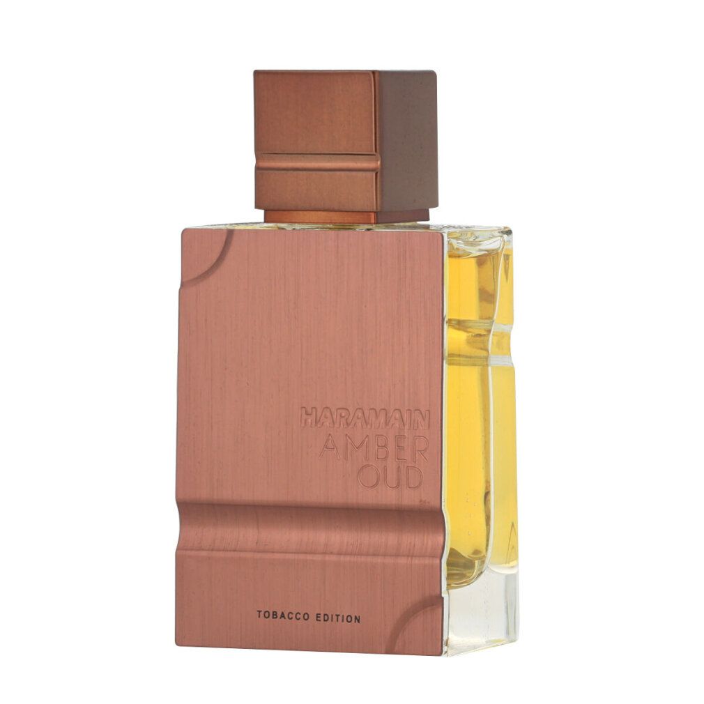 Flacone di profumo. Scritta: Al Haramain, Amber Oud Tobacco Edition. Flacone nei toni del marrone e dell'oro.