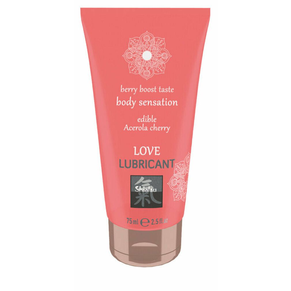 Tubo rosa con testo bianco. Contiene 'LOVE LUBRICANT', 'berry boost taste', 'edible Acerola cherry'. Marchio: Shiatsu.
