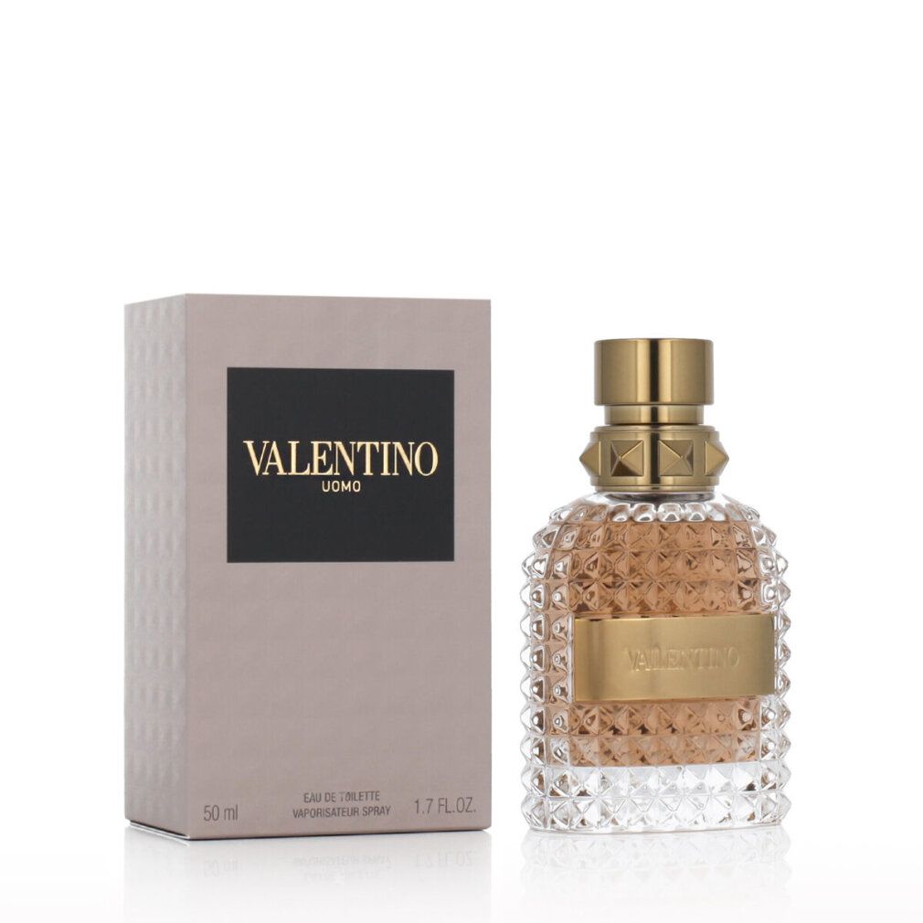 Valentino Uomo Eau de Toilette. Flacone e confezione. Tappo dorato, etichetta. Confezione con logo.