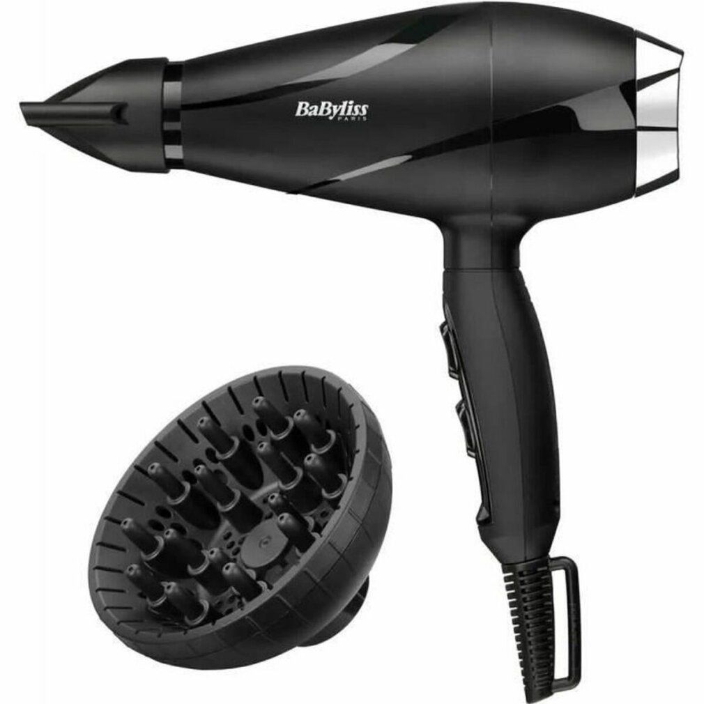Asciugacapelli nero con diffusore. Marca: BaByliss. Diffusore accanto. Impugnatura con comandi.
