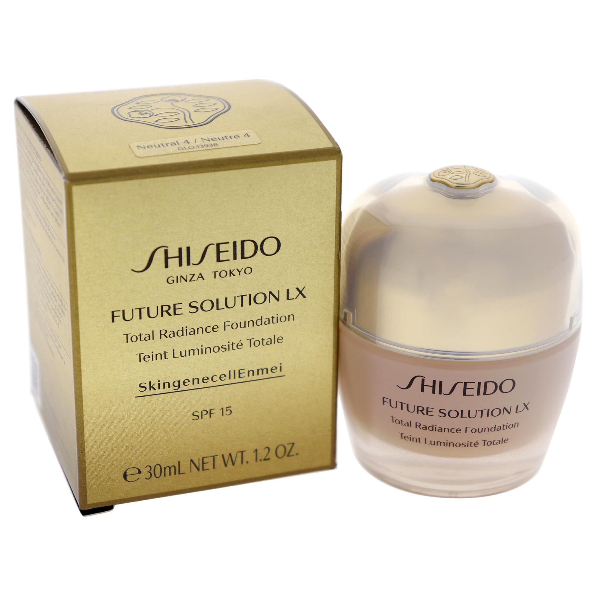 Flacone di fondotinta e scatola dorata. Scritta Shiseido, Future Solution LX, Total Radiance Foundation, SPF 15.