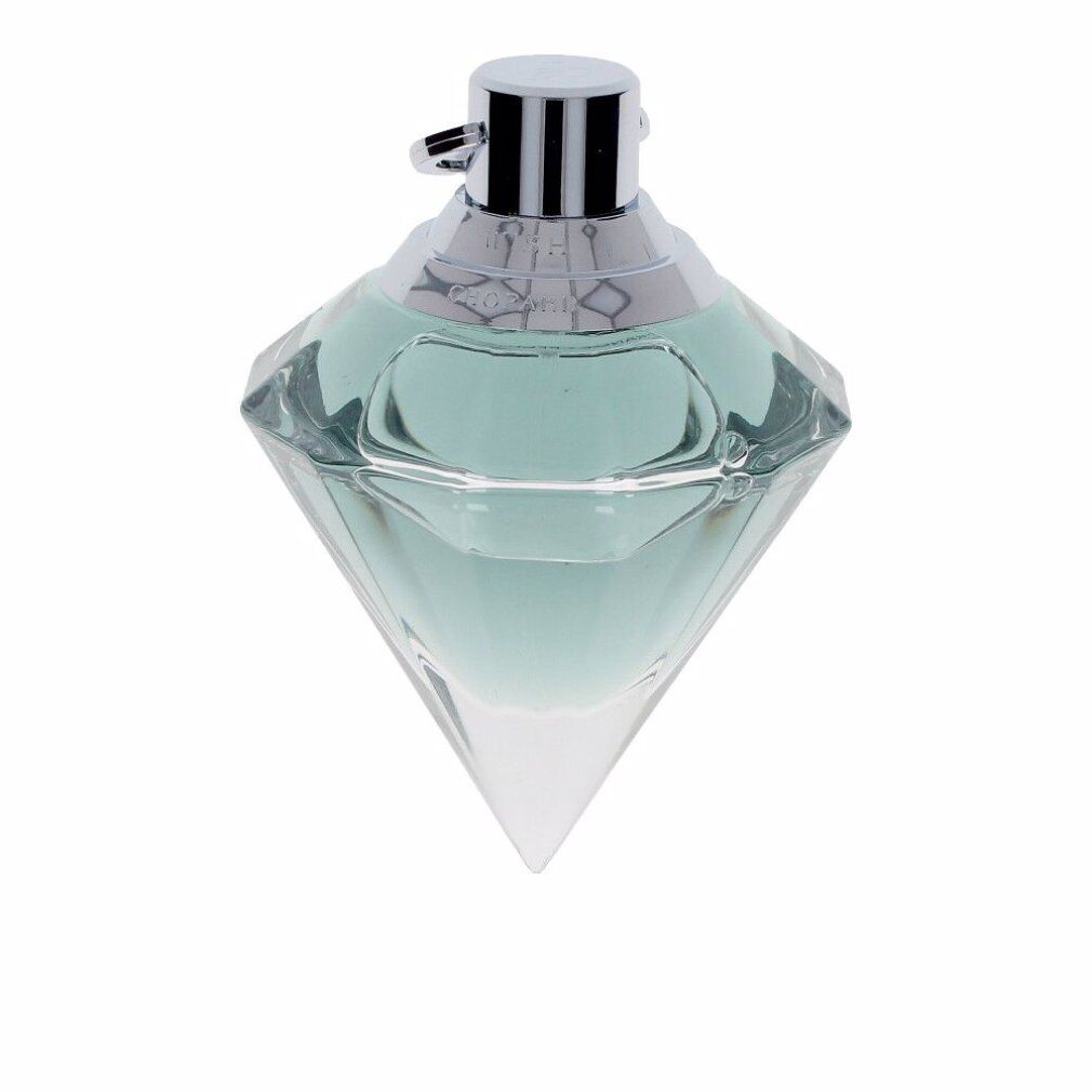 Flacone di profumo a forma di diamante. Liquido verde chiaro. Chiusura argentata. Scritta sul tappo.