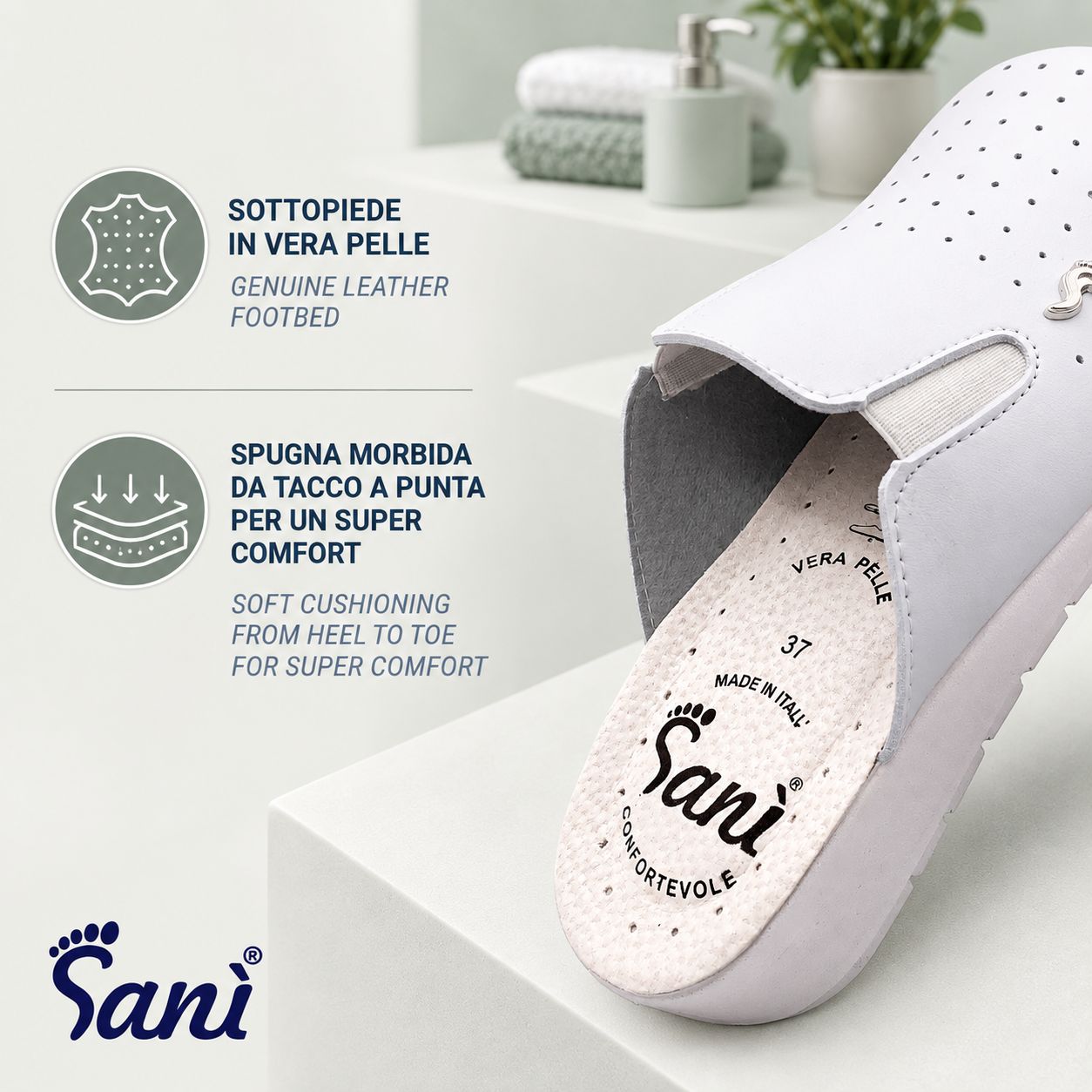Zoccolo bianco Sani con tomaia traforata in pelle. Elastico integrato per il comfort. Prodotto in Italia.