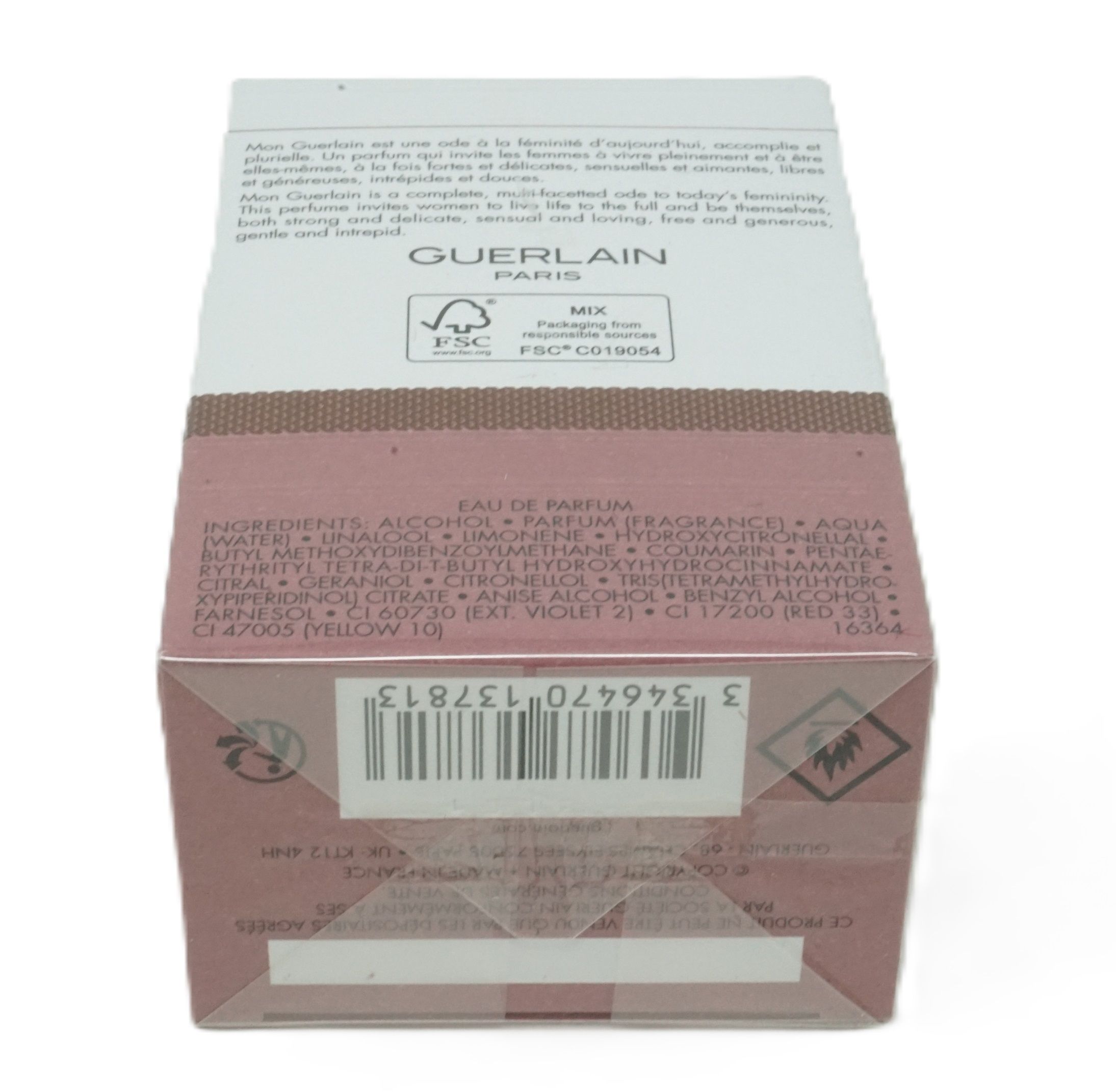 Fondo della confezione Mon Guerlain Eau de Parfum Intense. Codice a barre, testo e colore rosa-marrone. Logo FSC.