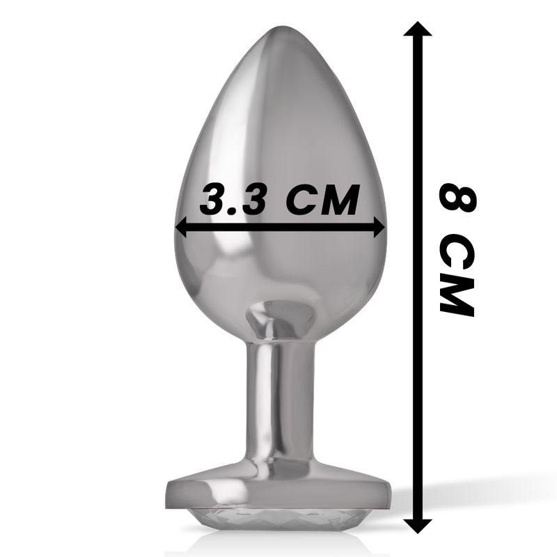 Plug anale argentato con cristallo a forma di cuore. Dimensioni: 8 cm di lunghezza, 3,3 cm di larghezza.