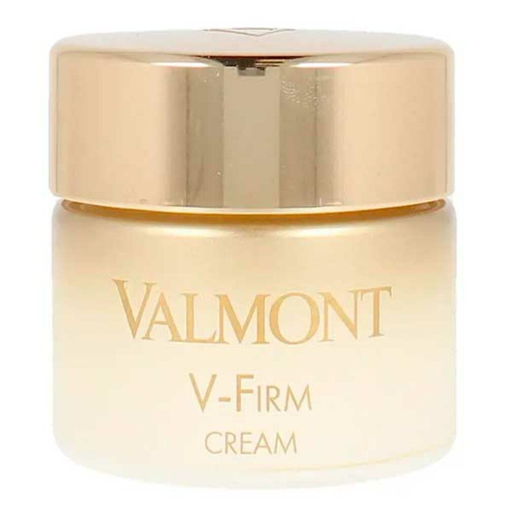 Vaso di crema con coperchio dorato. Scritta: VALMONT, V-Firm, CREAM. Sfumatura da bianco a oro.