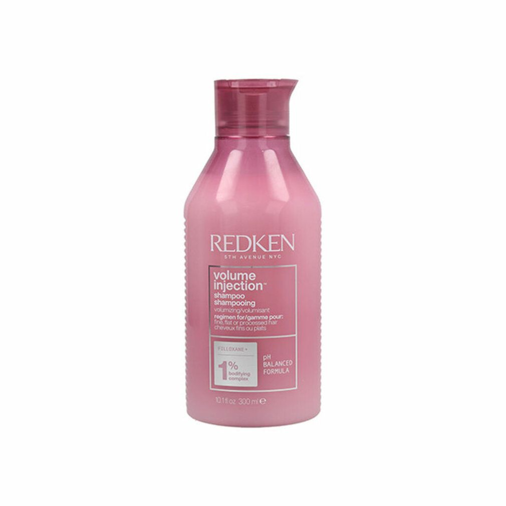 Flacone di shampoo rosa con testo bianco. Marchio: Redken. Nome prodotto: Volume Injection Shampoo. Formula pH bilanciata.