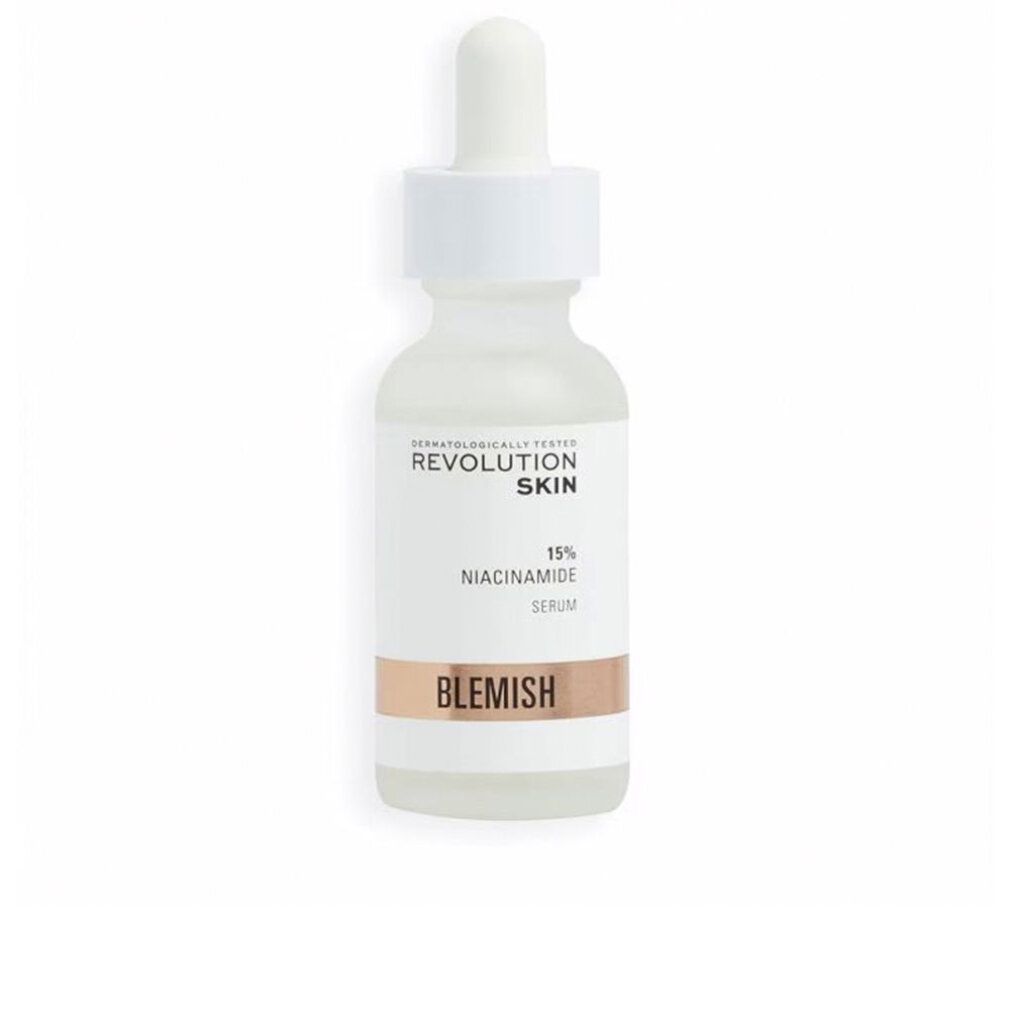 Flacone bianco con siero e pipetta. Scritta: Revolution Skin, 15% Niacinamide Serum, Blemish.