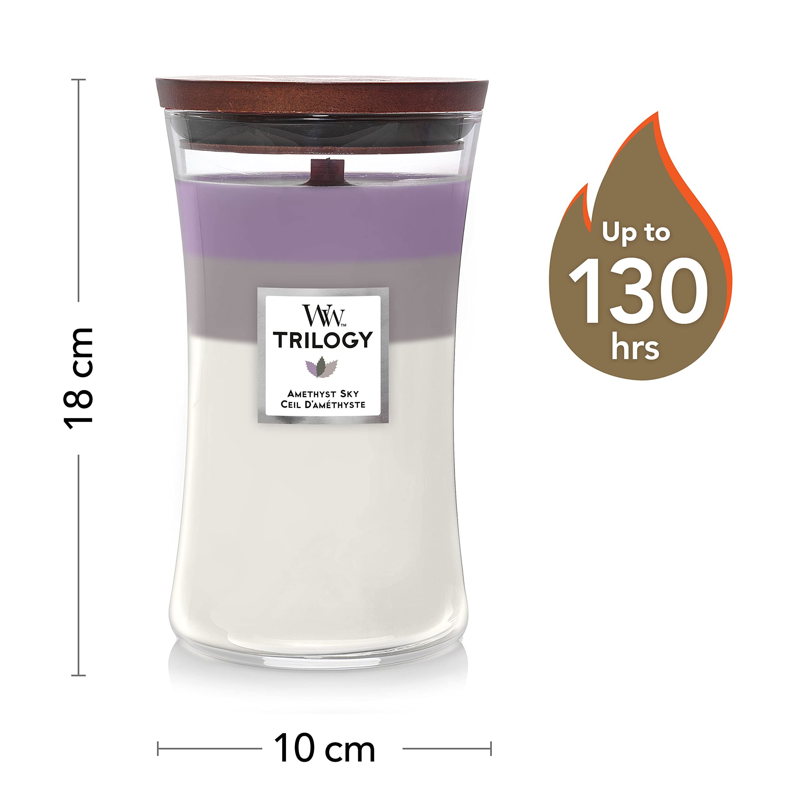 Candela a tre colori con coperchio in legno. Dimensioni: 18 cm altezza, 10 cm larghezza. Fino a 130 ore di combustione.