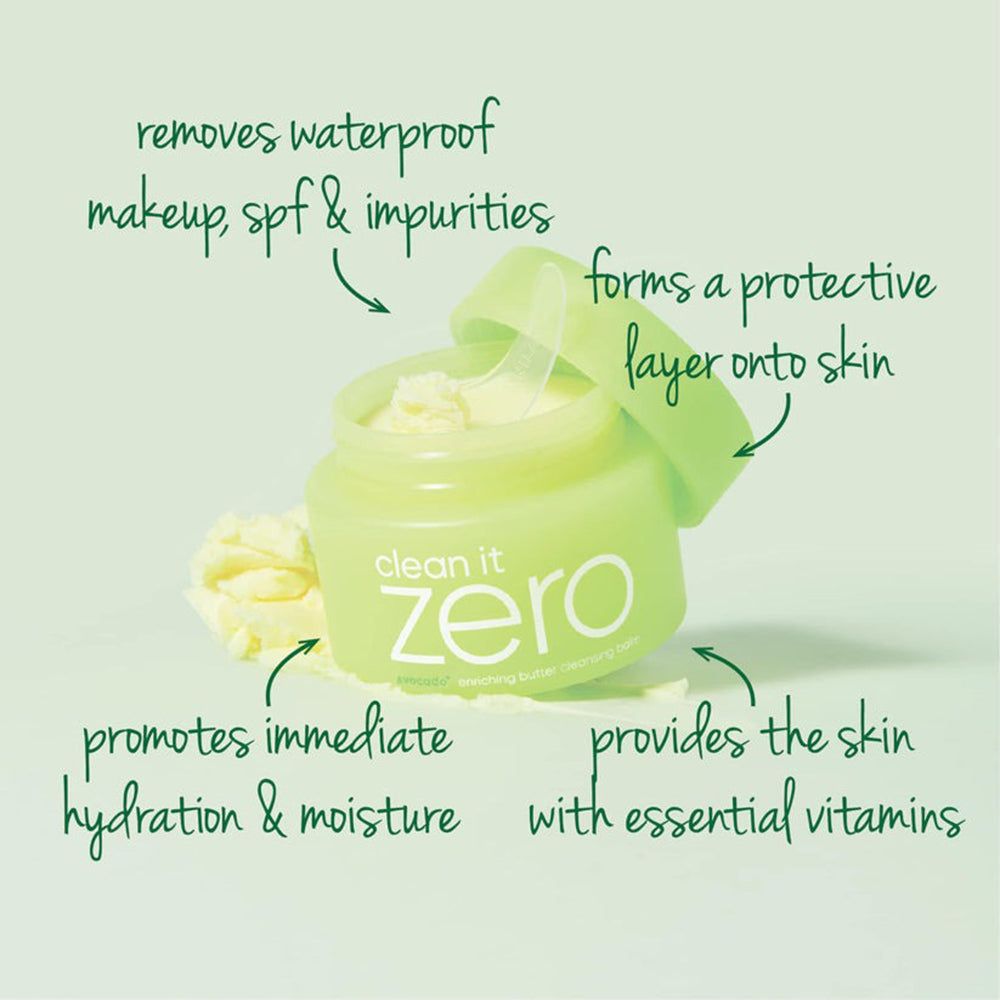 Contenitore verde con coperchio aperto, circondato da fette di avocado e consistenza burrosa.