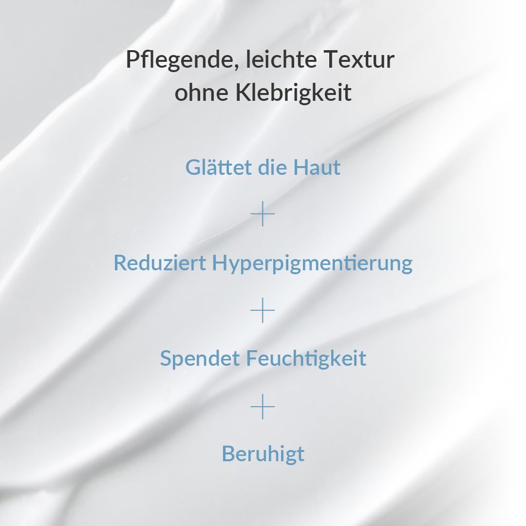 Texture crema bianca. Testo: Leviga la pelle, Riduce l'iperpigmentazione, Idrata, Calma.