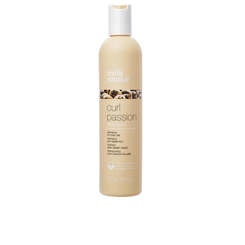 Flacone di shampoo beige con tappo bianco. Scritta: milk_shake, curl passion shampoo. Per capelli ricci.