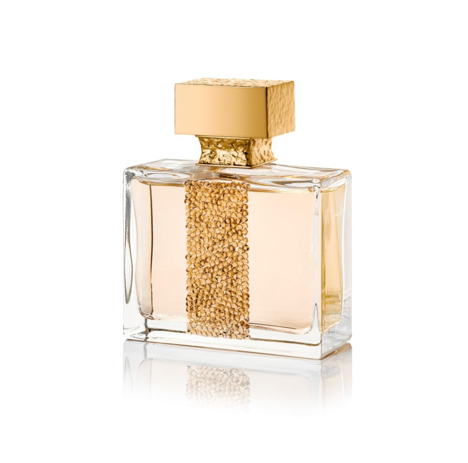 Flacone di profumo rettangolare con tappo dorato e decorazione. Flacone in vetro con decorazione dorata.