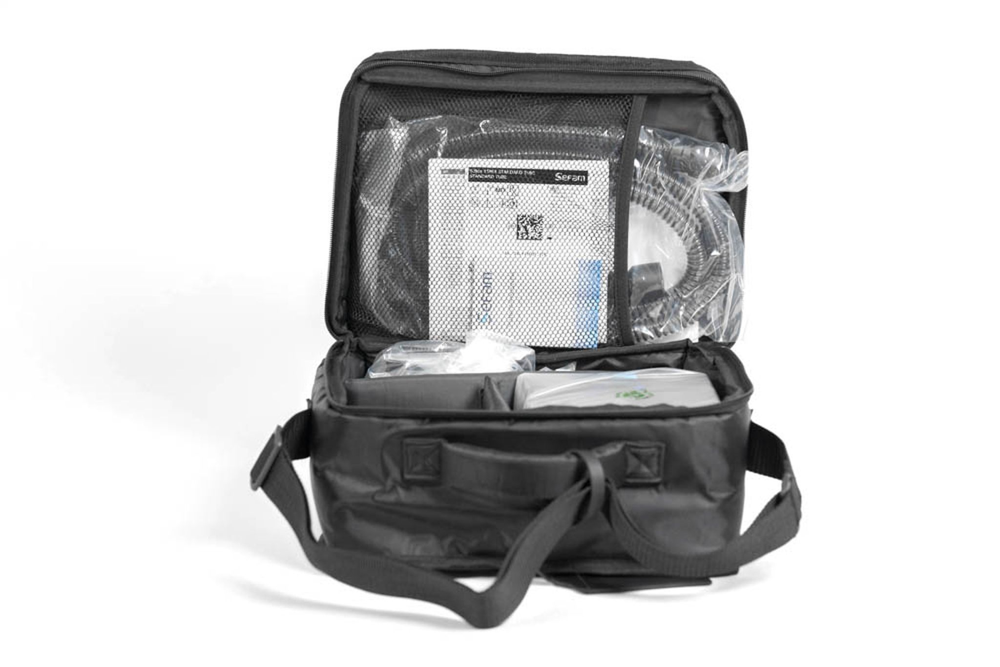 Borsa da trasporto Sefam Néa DUO ST aperta con dispositivo e accessori.