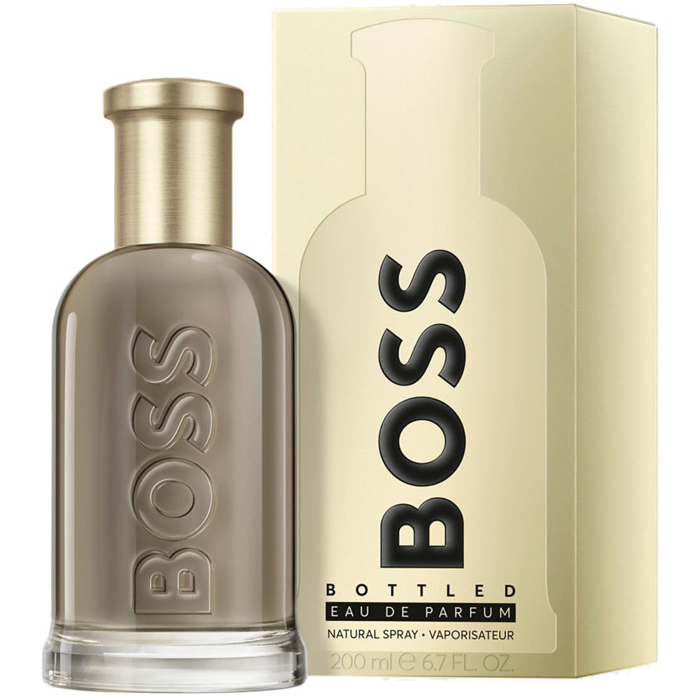 Flacone di profumo e confezione. Flacone con tappo dorato, scritta BOSS. Confezione con logo BOSS e nome del prodotto.