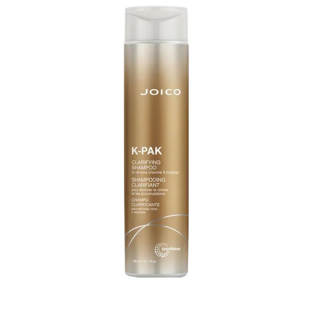 Flacone di shampoo chiarificante Joico K-Pak. Bottiglia dorata con tappo bianco. Scritte in inglese, francese e spagnolo.