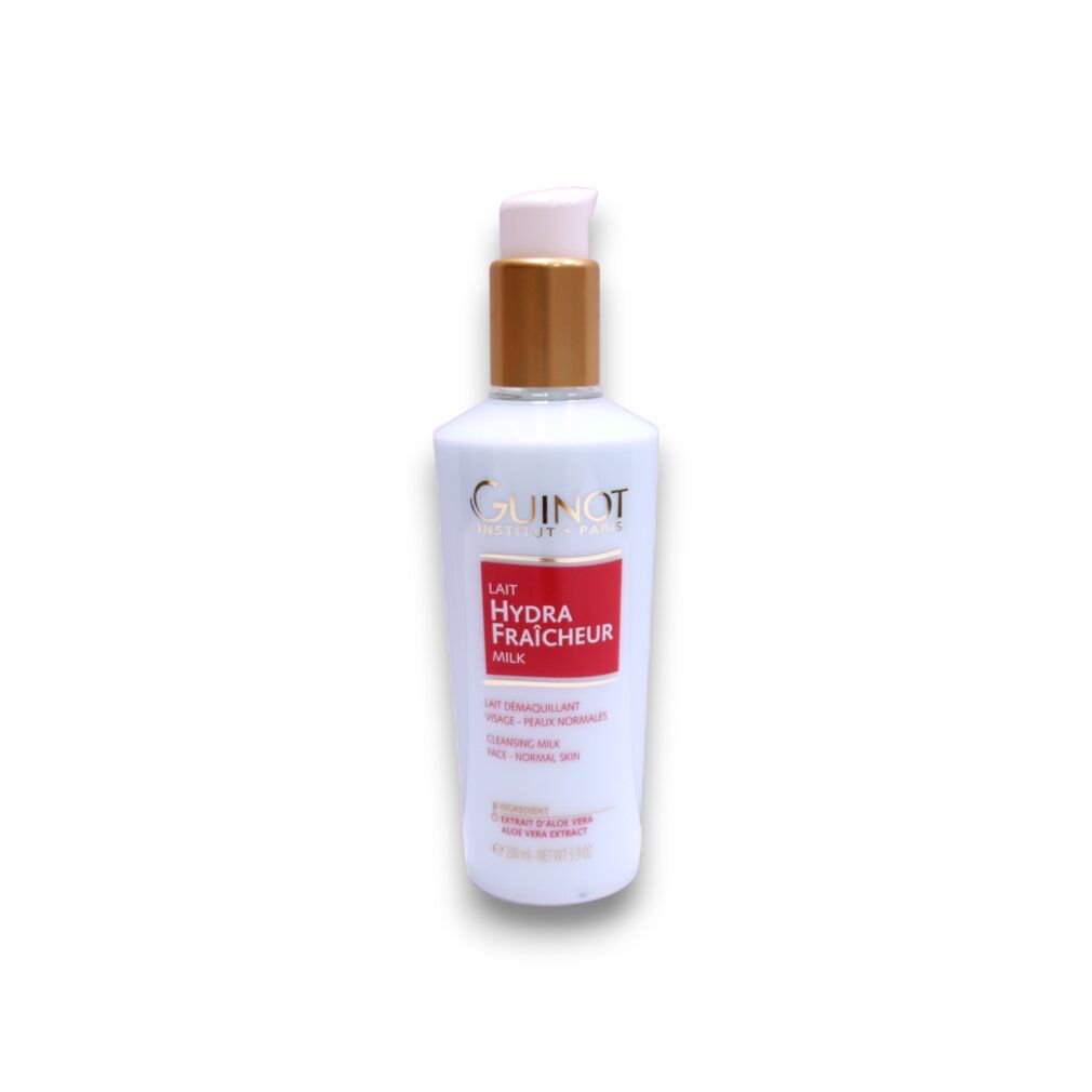 Guinot Lait Hydra Fraicheur latte detergente, flacone bianco con pompa, accento dorato.