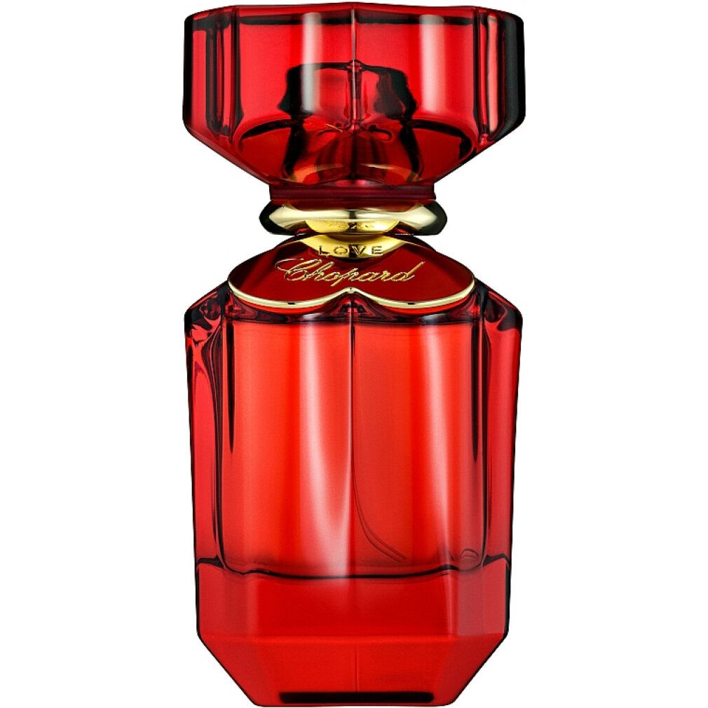 Flacone rosso con tappo dorato. Scritta: Love Chopard. Forma geometrica.