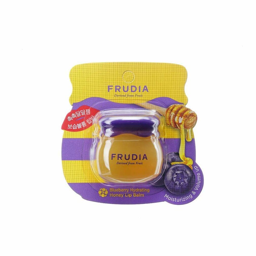 Confezione con balsamo labbra al miele. Scritta FRUDIA, con 'Blueberry Hydrating Honey Lip Balms'.