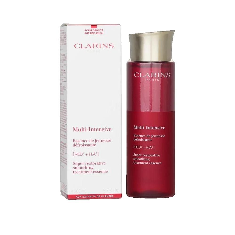 Flacone rosso con tappo dorato. Testo: CLARINS PARIS, Multi-Intensive, Essence de jeunesse défroissante.