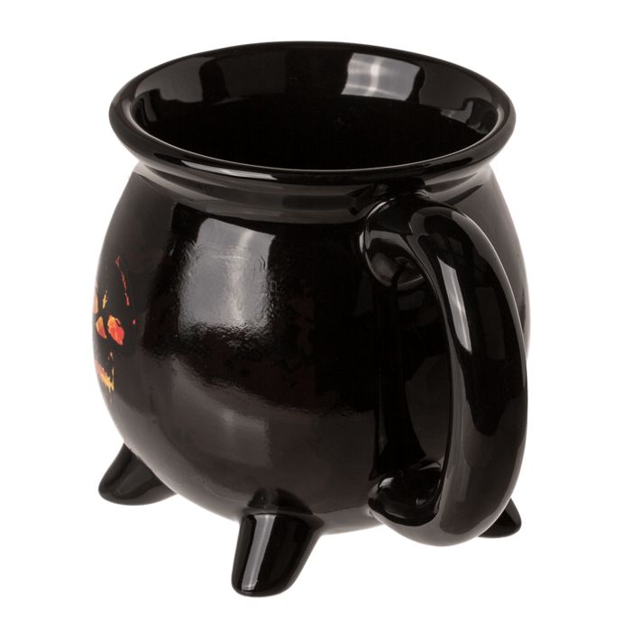 Tazza in ceramica nera a forma di calderone con manico e tre piedi. Design teschio e fiamme.