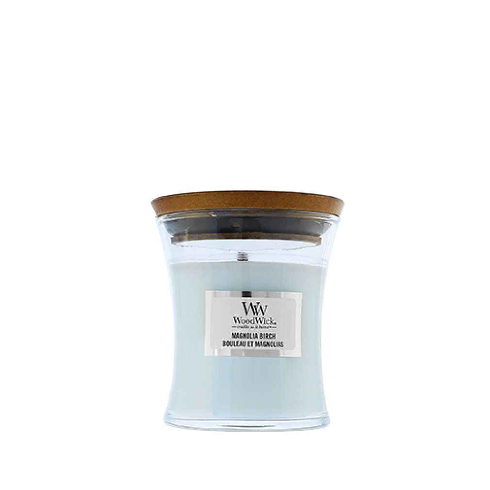 Candela a clessidra con coperchio in legno. Etichetta con marchio e nome del prodotto.