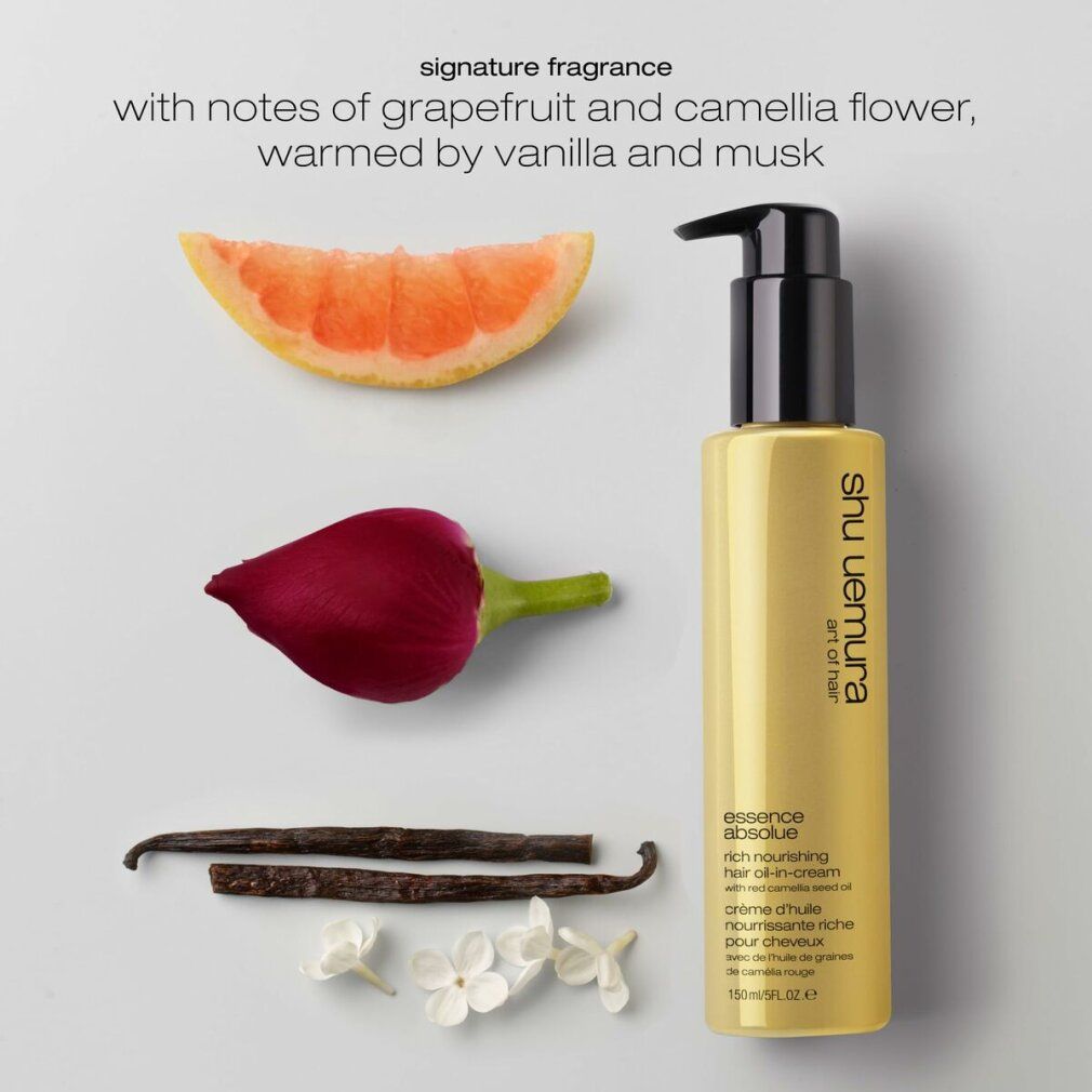 Flacone dorato con erogatore nero, pompelmo, baccelli di vaniglia, fiori. Scritta: Shu Uemura.