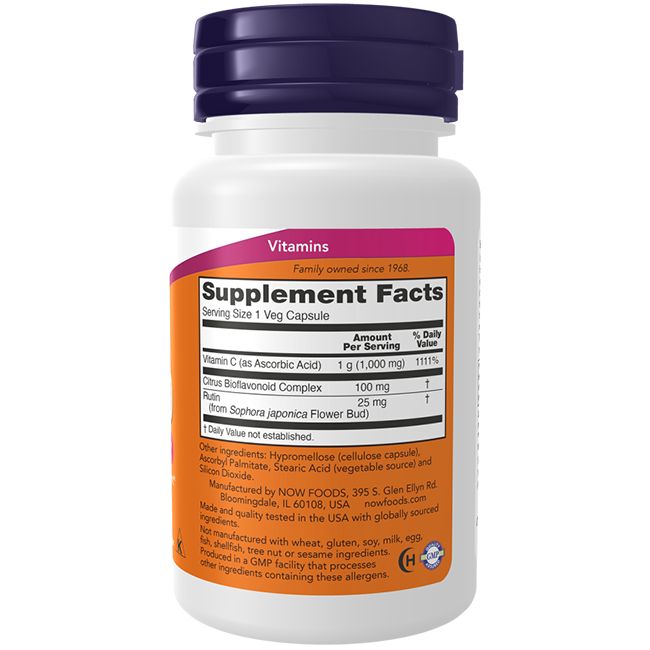 Flacone bianco con tappo viola. Etichetta con informazioni sulla vitamina C. Scritta: NOW FOODS. Contiene 1000 mg di vitamina C.