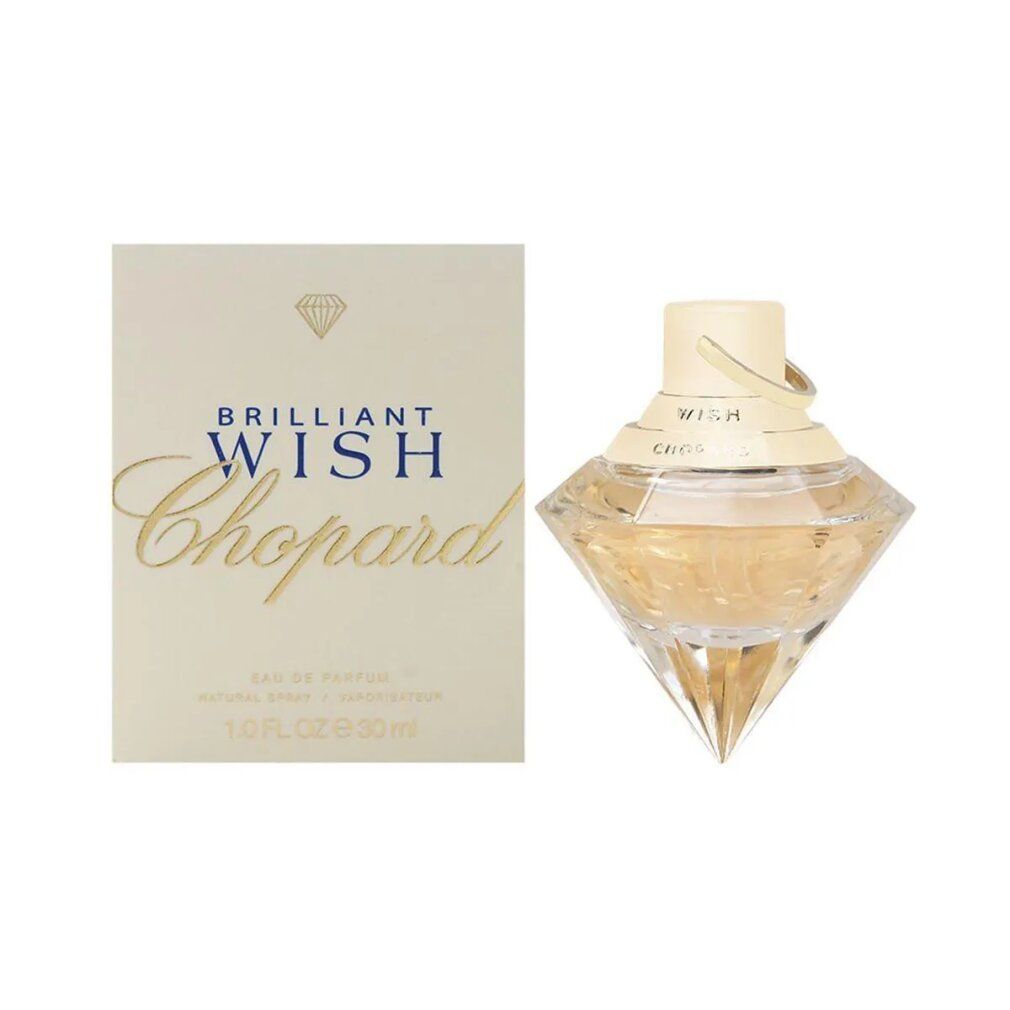 Flacone di profumo e confezione. Flacone a forma di diamante, giallo chiaro. Confezione color crema con scritta 'Brilliant Wish Chopard'.