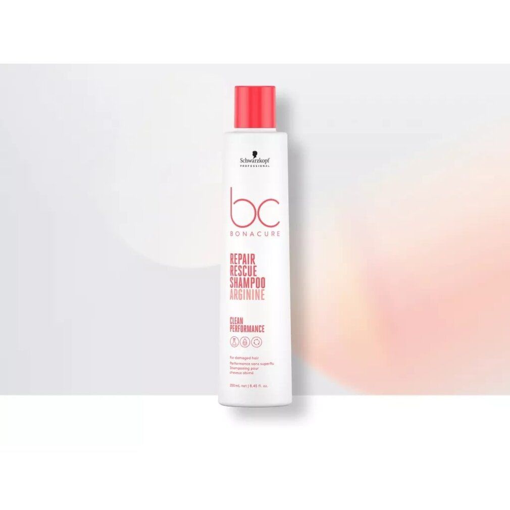 Shampoo bianco con tappo rosso. Scritta: BC Bonacure Repair Rescue Shampoo Arginine. Su sfondo chiaro.