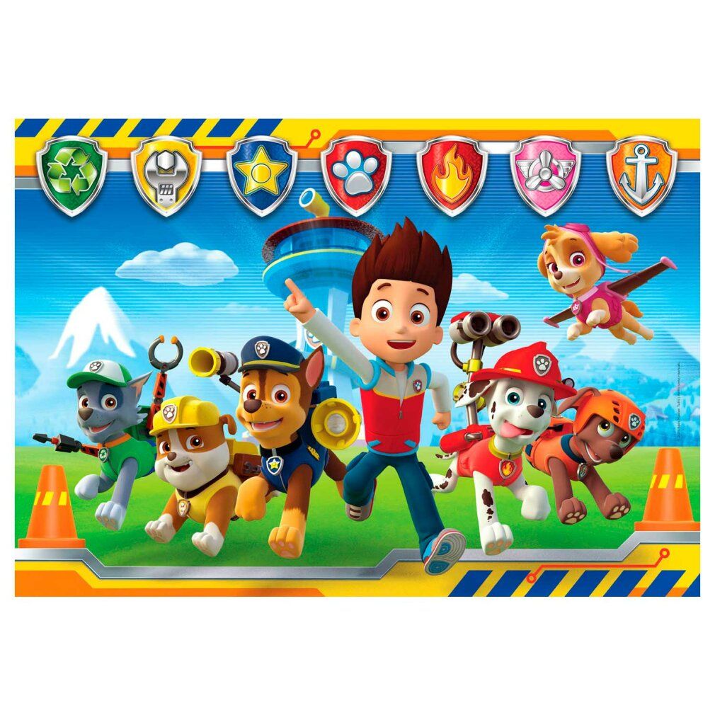 Puzzle Paw Patrol completato con 104 pezzi. I personaggi di Paw Patrol sono raffigurati. Sfondo: cielo blu ed erba verde.