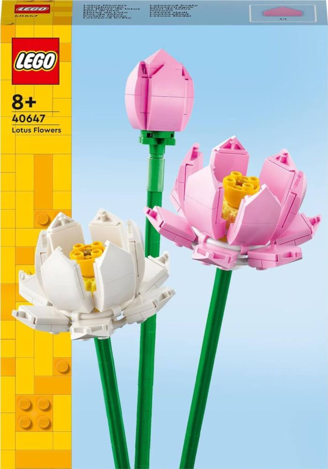 LEGO Creator 40647. Tre fiori di loto in plastica. Uno a bocciolo, due aperti. Steli verdi, fiori rosa e bianchi. Confezione visibile.