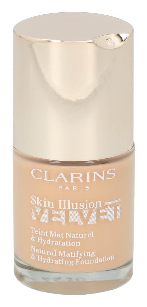 Flacone di fondotinta beige con tappo dorato. Scritta: Clarins, Skin Illusion Velvet, Teint Mat Naturel & Hydratation.