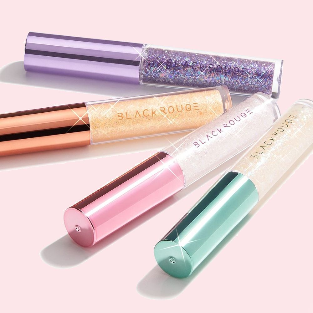 Diversi tubi di ombretto BLACK ROUGE Pearlvely I Glitter. Colori: viola, oro, bianco e verde. Effetto glitter.