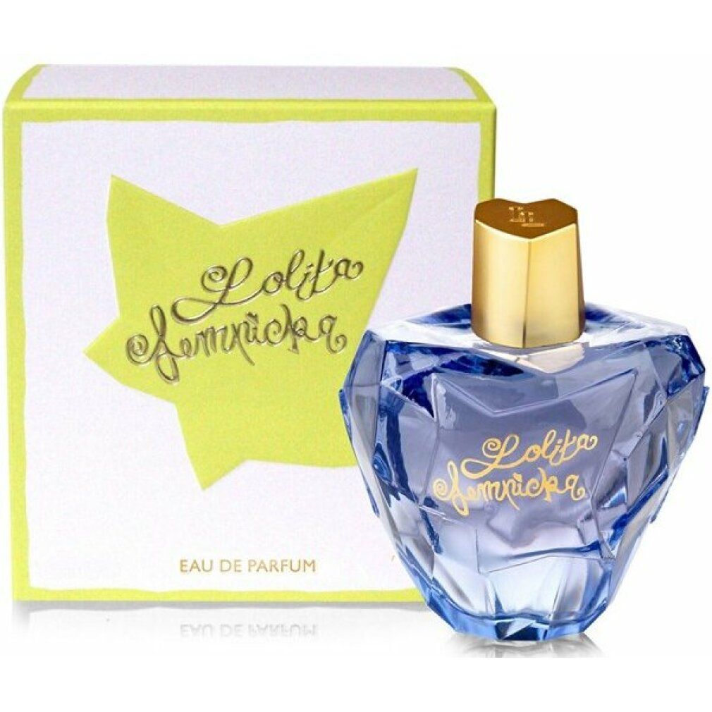 Lolita Lempicka Eau de Parfum Spray e confezione. Flacone blu, tappo dorato. Confezione con stella gialla e scritta.