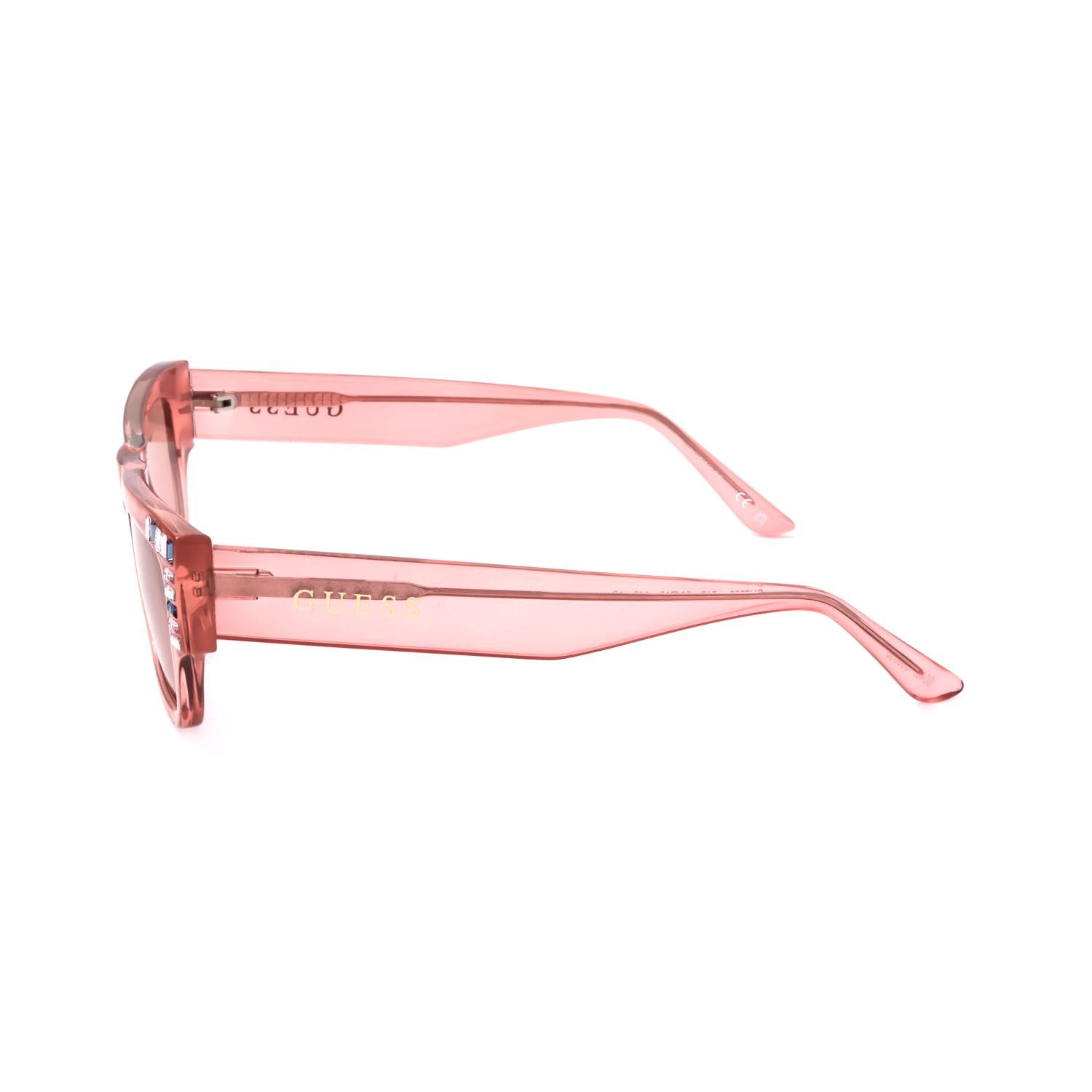 Occhiali da sole rosa con strass sulle aste e sul davanti. Montatura trasparente.