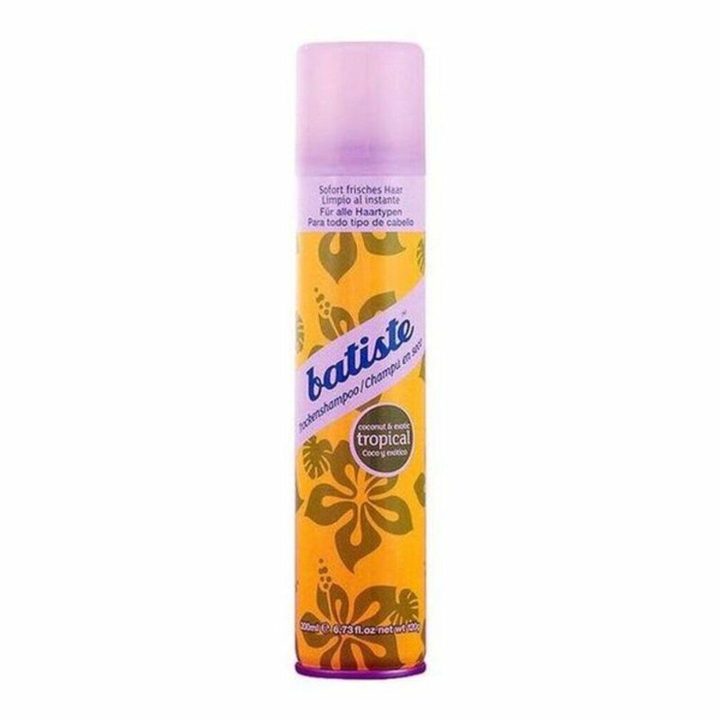Bomboletta spray gialla con tappo viola. Scritta "Batiste Dry Shampoo Tropical". Decorazioni floreali.
