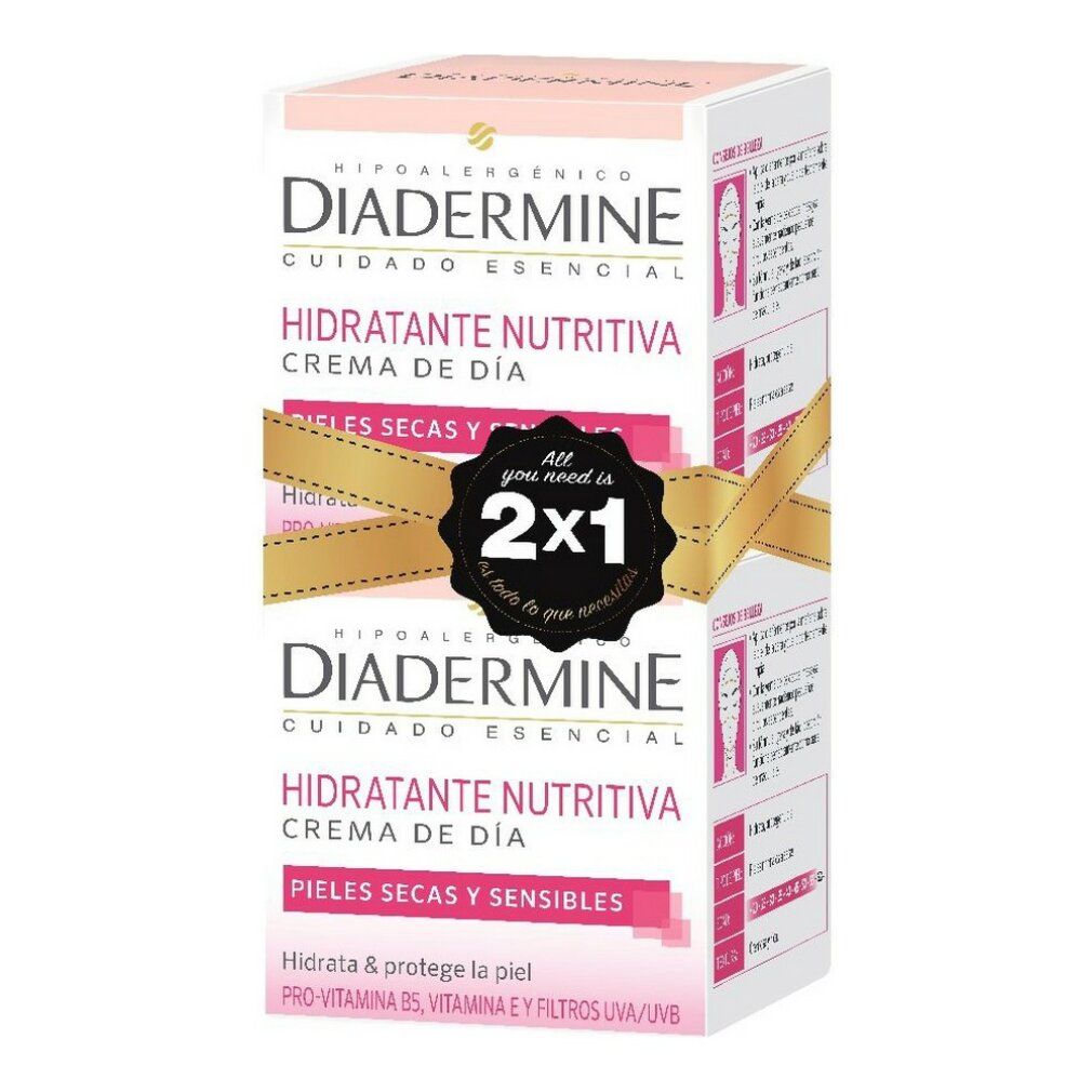 Confezione crema giorno Diadermine. Design rosa e bianco con nome del prodotto e offerta 2x1. Contiene testo su ingredienti e tipo di pelle.