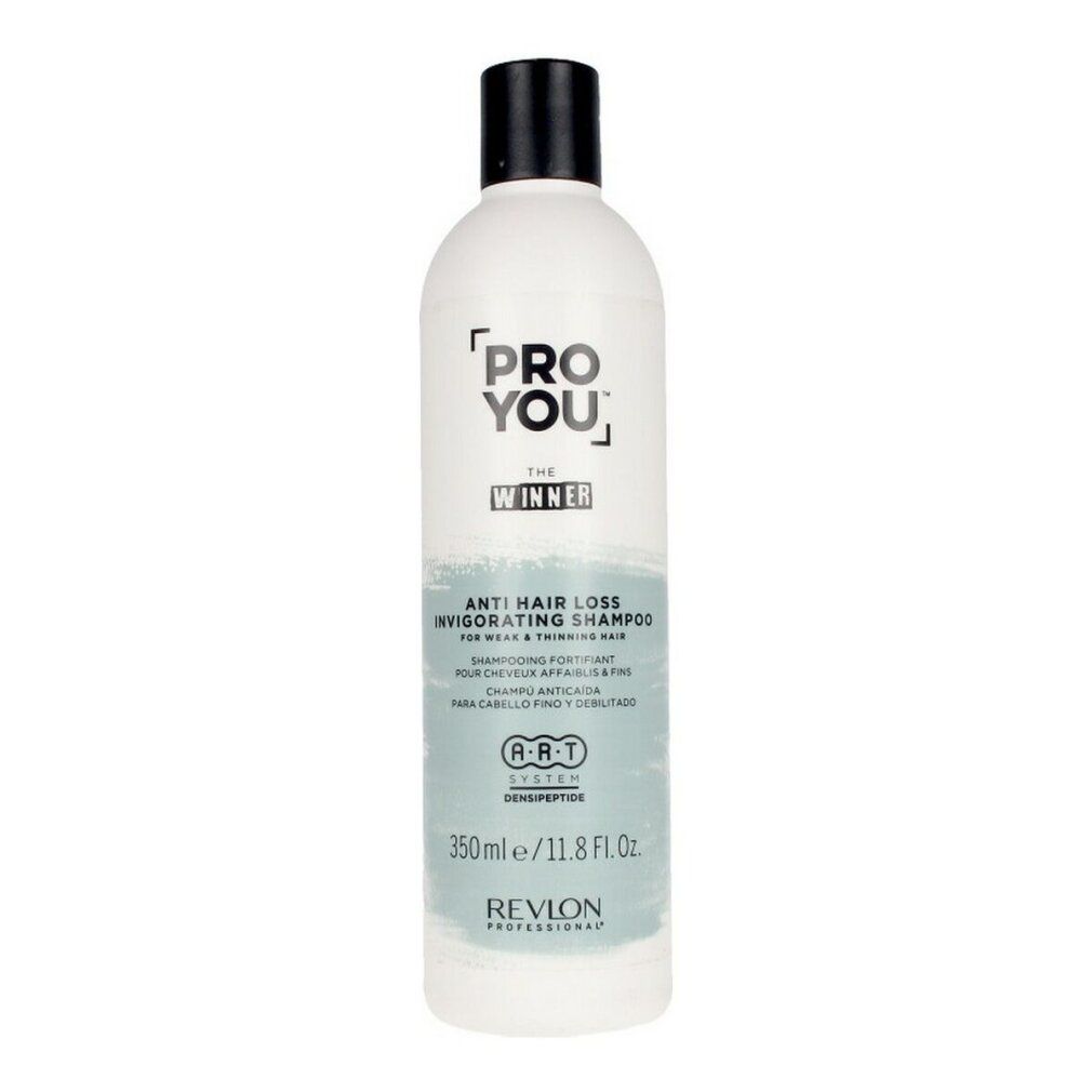 Flacone bianco con tappo nero. Scritta: PRO YOU, THE WINNER, shampoo anticaduta. Revlon Professional. 350ml.