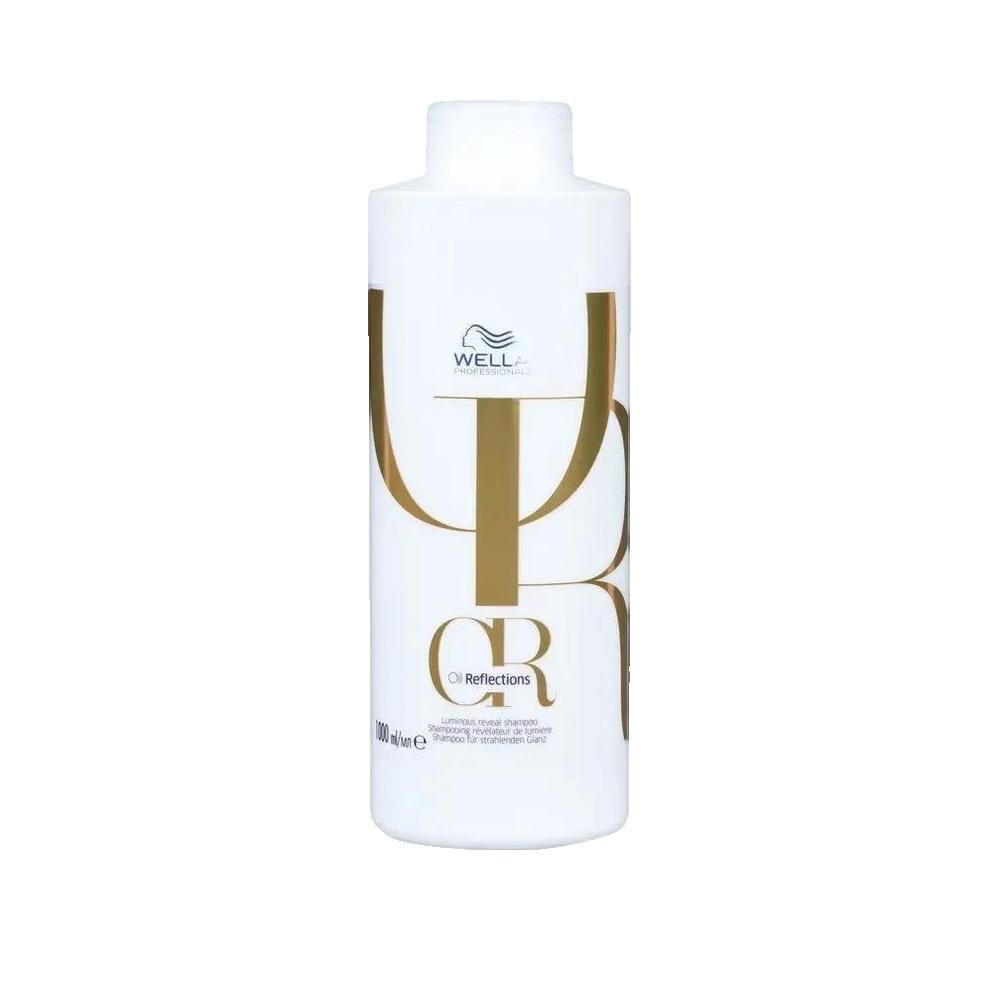 Flacone di shampoo bianco con logo e testo dorati. Scritta: Oil Reflections. Marchio: Wella Professionals.