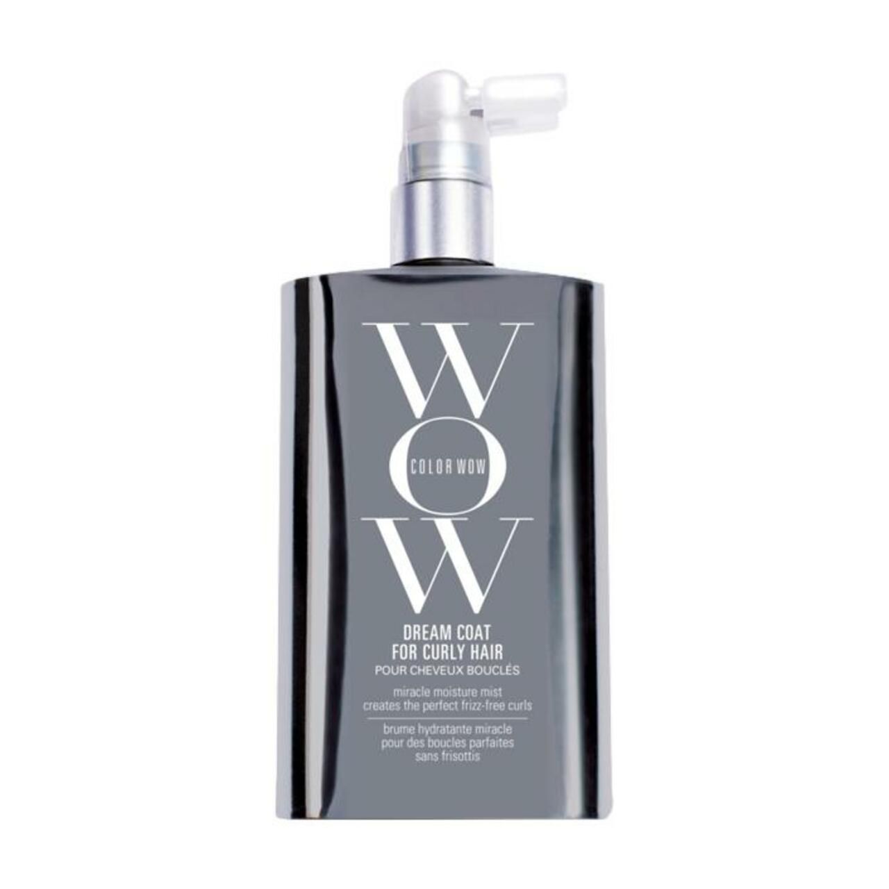 Flacone grigio con erogatore spray. Scritta: Color Wow, Dream Coat for Curly Hair. Testo: Miracle moisture mist creates the perfect frizz-free curls.