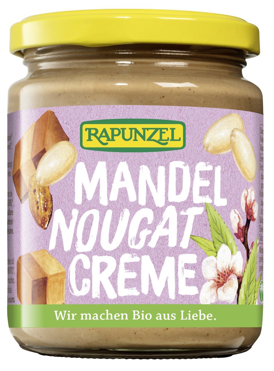 Rapunzel Crema Mandorle e Torrone in barattolo. Etichetta viola con nome prodotto, mandorle, pezzi di torrone e fiori di mandorlo.