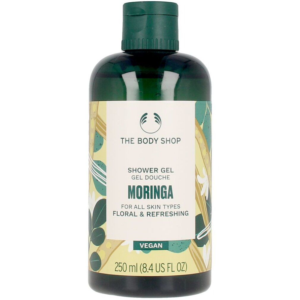 Flacone di gel doccia verde con tappo verde. Scritta: The Body Shop, Moringa, vegan. 250 ml.
