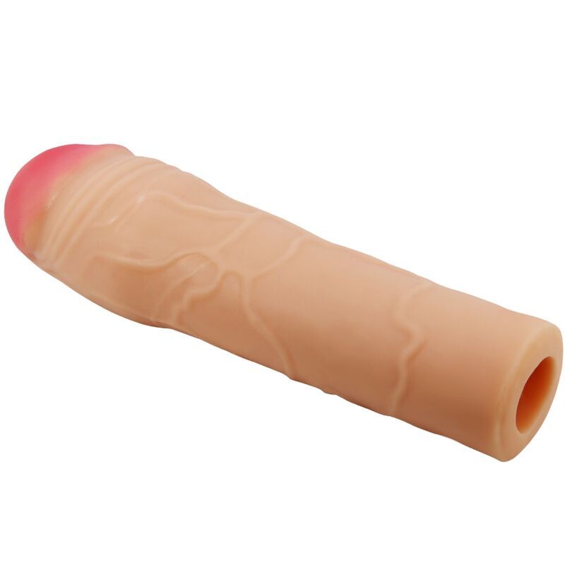 Manicotto di estensione del pene color carne con texture realistica e punta rosa.
