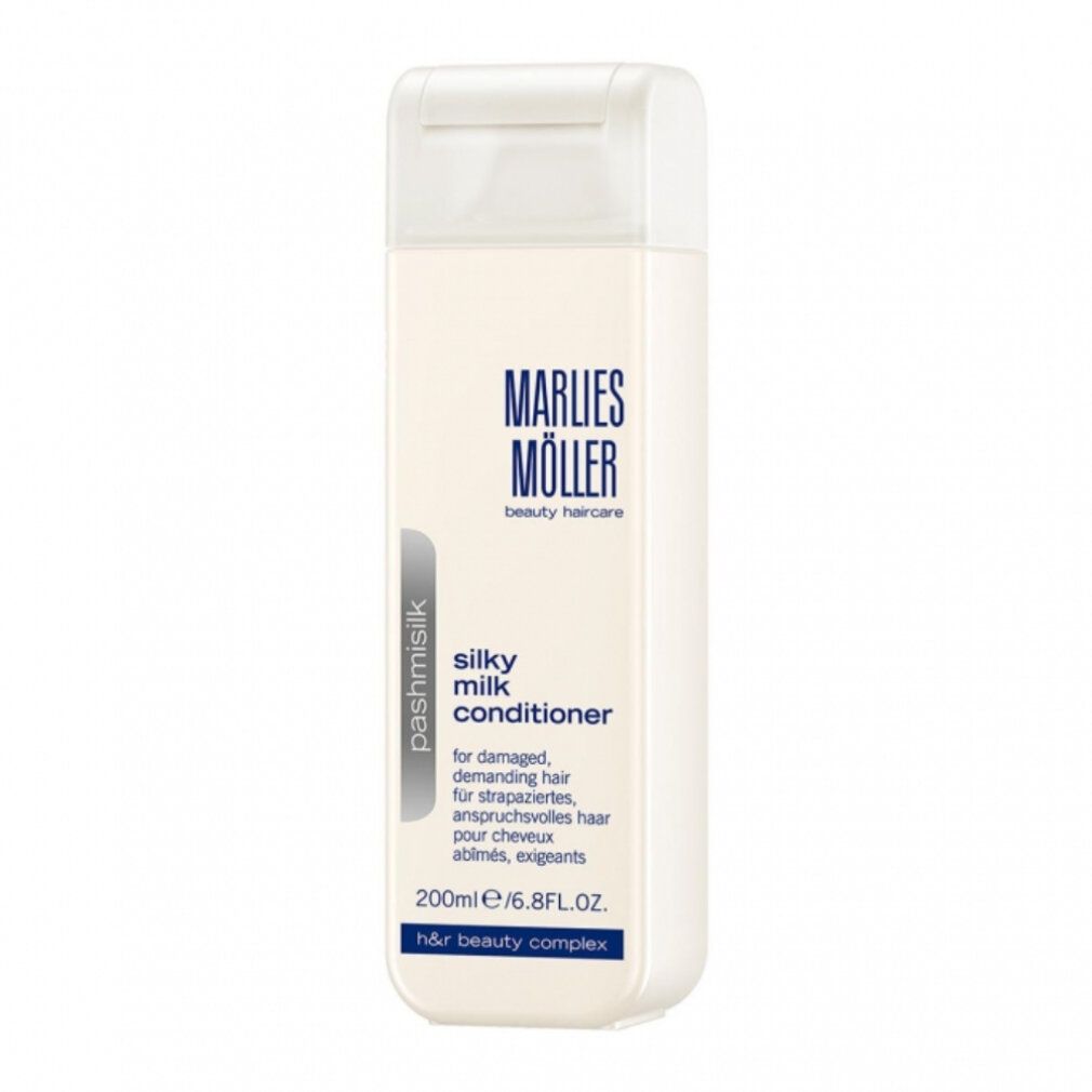 Flacone rettangolare bianco. Scritta: Marlies Möller, Silky Milk Conditioner. Testo in tedesco, francese, inglese.