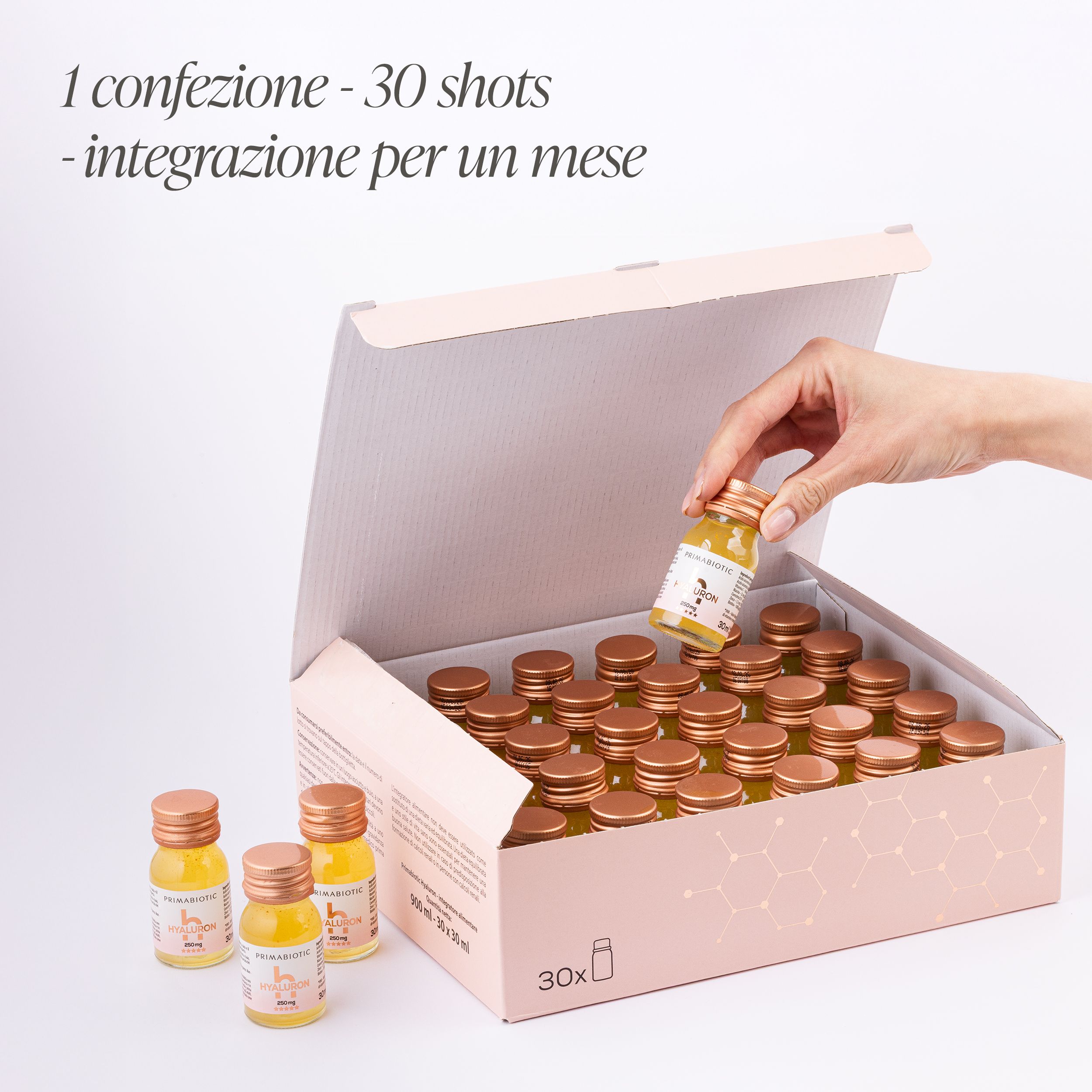 Primabiotic Hyaluron Shot: Confezione aperta con 30 fiale, una fiala viene estratta.